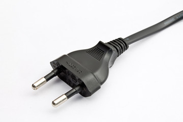 black plug closeup on white background