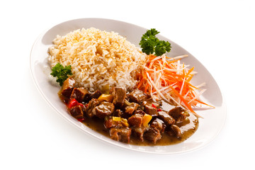 Roasted meat, white rice and vegetables 