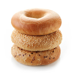 Fresh bagels on white background