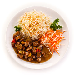 Roasted meat, white rice and vegetables 
