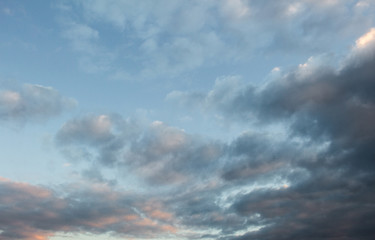 Blue, dark, gray clouds.Sunset. Background