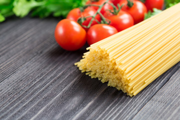 Italian spaghetti on a wooden table.