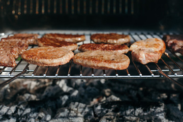Hamburger grilling in garden