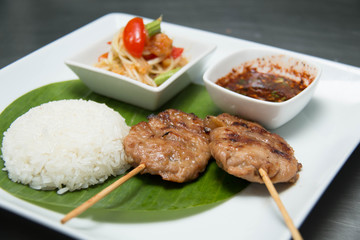 Grilled pork with sticky rice