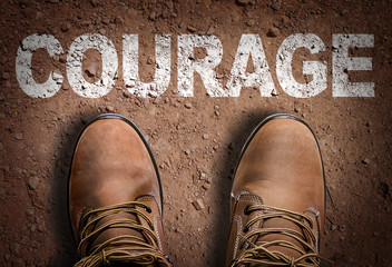 Top View of Boot on the trail with the text: Courage