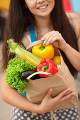 Healthy vegetables food in woman hand, girl shopping market ar supermarket 