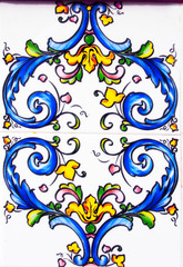 Detail of the traditional tiles from facade of old house in Valencia, Spain