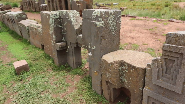 Row of megalithic stones in the complex Puma Punku near Tiwanaku, Bolivia