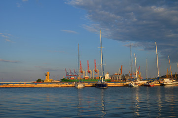 yachts in the port at sunset