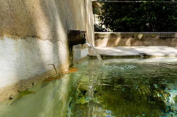 Fototapeten Old fountain Greoux les Bains © henryopzolder
