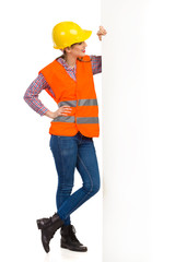 Female Construction Worker Reading Banner