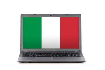 Laptop and flag of Italy