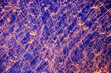 Pink lights background texture - blurred, random and chaotic, abstract red  light beams or patterns 