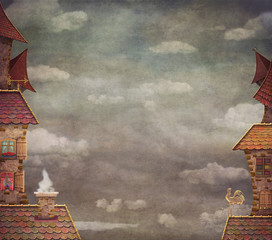 Fragment of a city .Tile Roofs with red sky