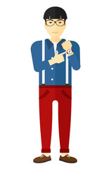 Angry boss pointing at wrist watch.