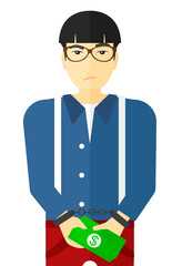 Man handcuffed for crime.