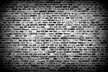 Fototapeta na wymiar Brick wall horizontal background with bricks - black and white