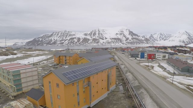 Solar panels on a roof at Svalbard aerial 2.7K ungraded