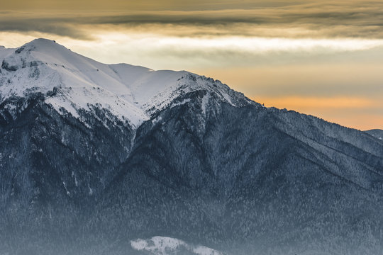 Sunset landscape over the Romanian Bucegi Mountains in winter season