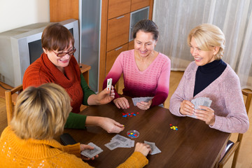 female staking money during bridge