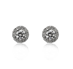 Pair of diamond earrings, isolated on white