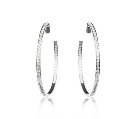 Pair of diamond earrings, isolated on white