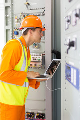 industrial technician checking transformer