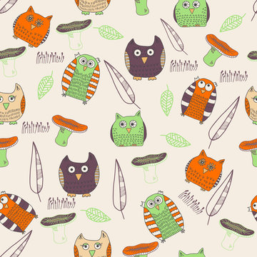 Seamless autumn pattern with owls and leaves.