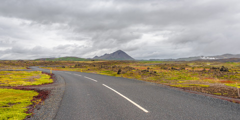 Isolated road and Icelandic colorful landscape at Iceland, summe