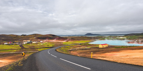 Isolated road and Icelandic colorful landscape at Iceland, summe
