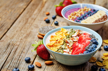 Blueberries and strawberries healthy smoothies breakfast bowls w