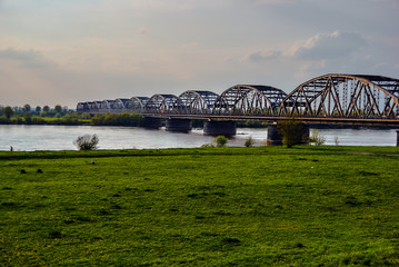 Arched, steel road bridge over the River Vistula in Grudziadz in Poland.