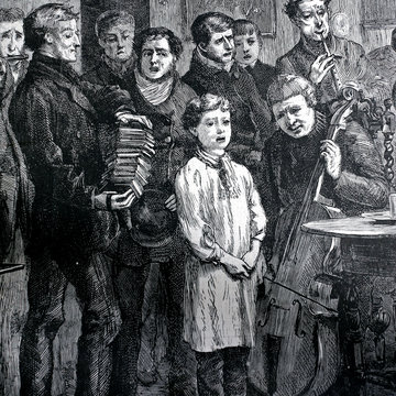 Young boy singing in an 1800s living room, concertina, cello, choir, penny whistle, celebration square crop