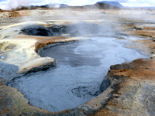 Geothermal field, Iceland. A depression with boiling clay.