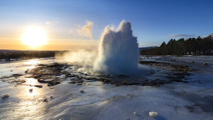 Geysir Strokkur, Iceland, in the sunrise in winter