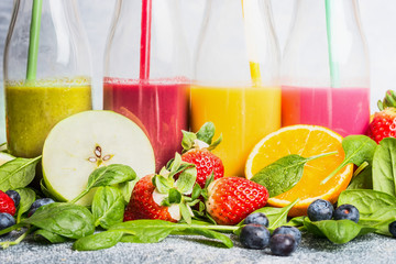 Close up of colorful smoothies with various ingredients.  Superfoods and healthy lifestyle or detox  diet food concept.