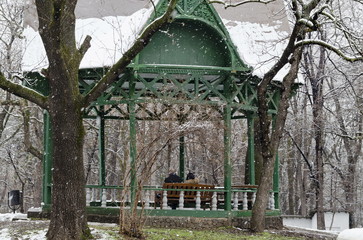 Romantic couple in summer-house at snowfall in winter, Sofia Bulgaria