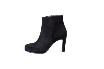Suede women's boots on a white background, black shoes, autumn and winter, side view