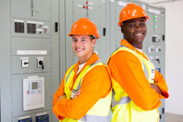 young industrial engineers with arms crossed