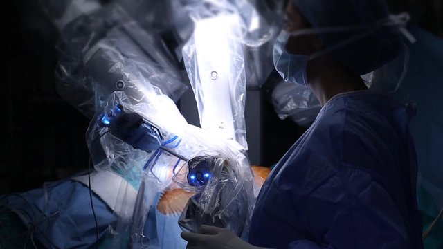 Medical operation involving robot. Robotic Surgery. Medical robot - Stock Video