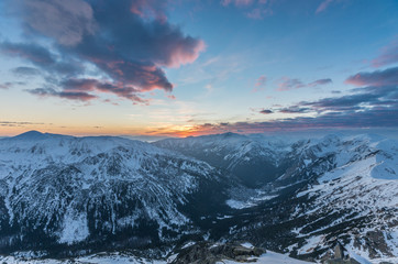 Fototapeta na wymiar Colorful mountain sunset panorama at winter in Western Tatras