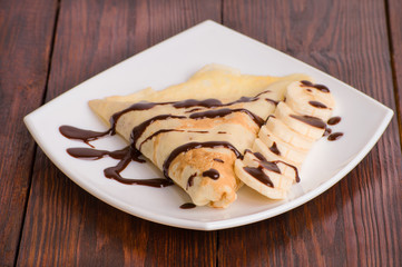 Crepes with bananas and cream