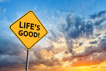 Sunset and yellow sign