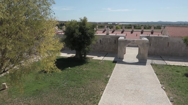 Aerial view of the restored medieval Templar town Maskovica Han in Vrana, it was the embassy of the Vatican, but was built before that as caravansary during otoman empire.