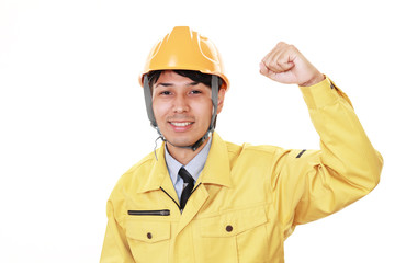 ガッツポーズの労働者