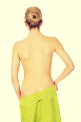 Young beautiful nude woman after bath or spa.
