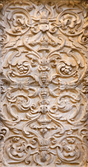 Granada - baroque stone decoration relief in church Monasterio de la Cartuja.