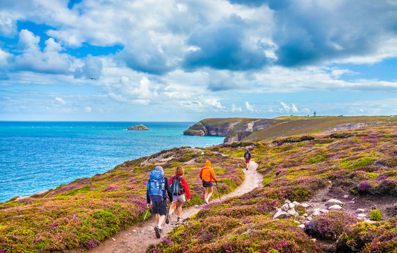 Tourists hiking at Cap Frehel, Bretagne, France