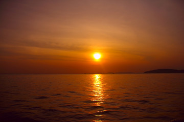 Fototapeta na wymiar Sunset above the sea