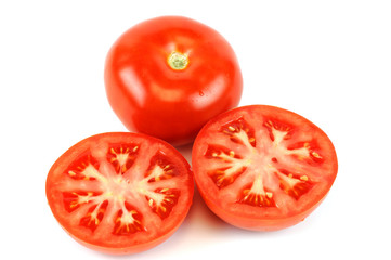 fresh whole tomato and half cut tomato on white background